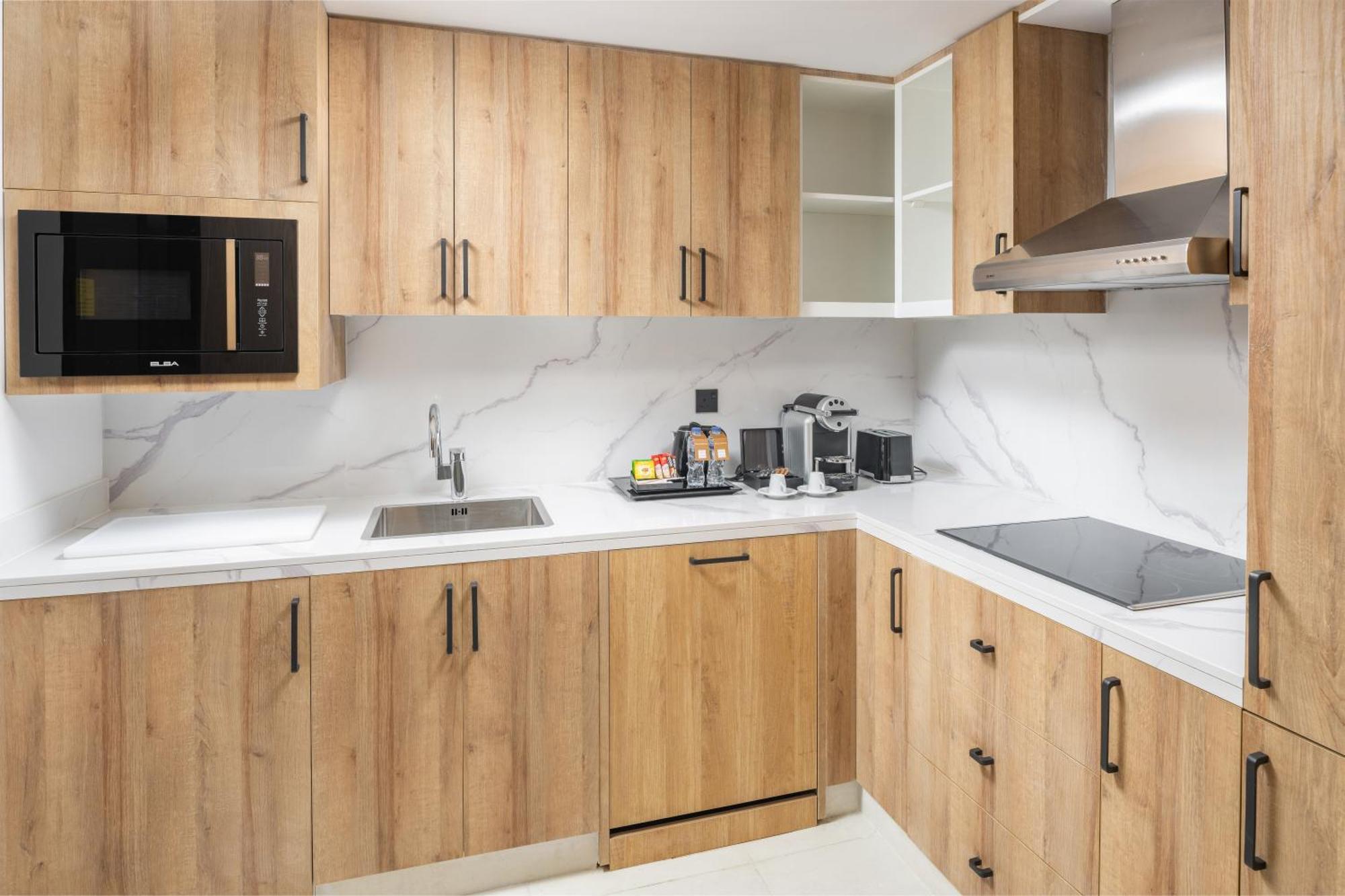 Taiba Suites Madinah Medina Kültér fotó A modern kitchen